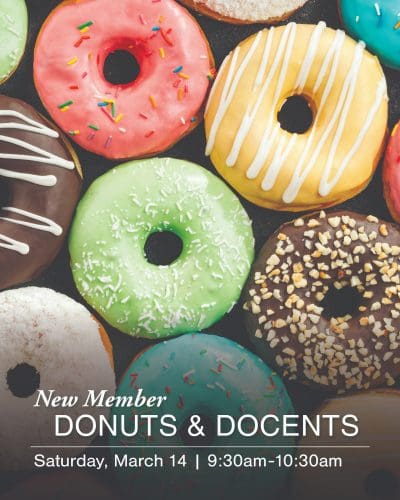 Assorted frosted donuts arranged on a tray invite you to our New Member Donuts & Docents event. Text overlay reads: Saturday, March 14 | 9:30am–10:30am.